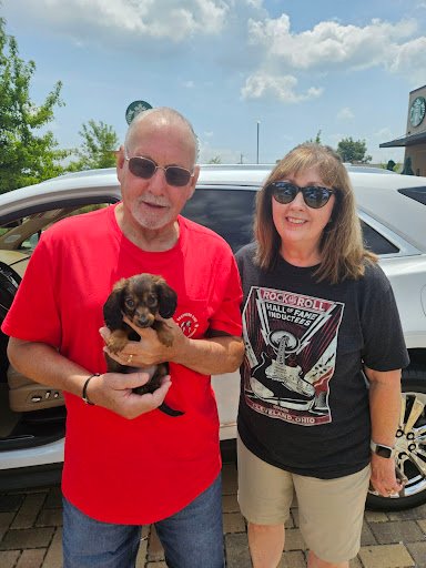 Linda Berry and family with their Isle of Doxies puppy